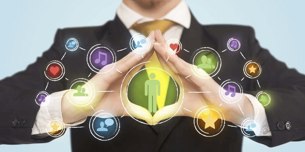 Hands creating a form with social media connection in the center-2